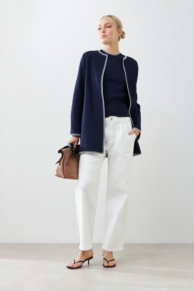 Sacon tejido pespunte en contraste azul marino