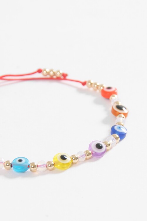 Pulsera ojitos regulable rojo