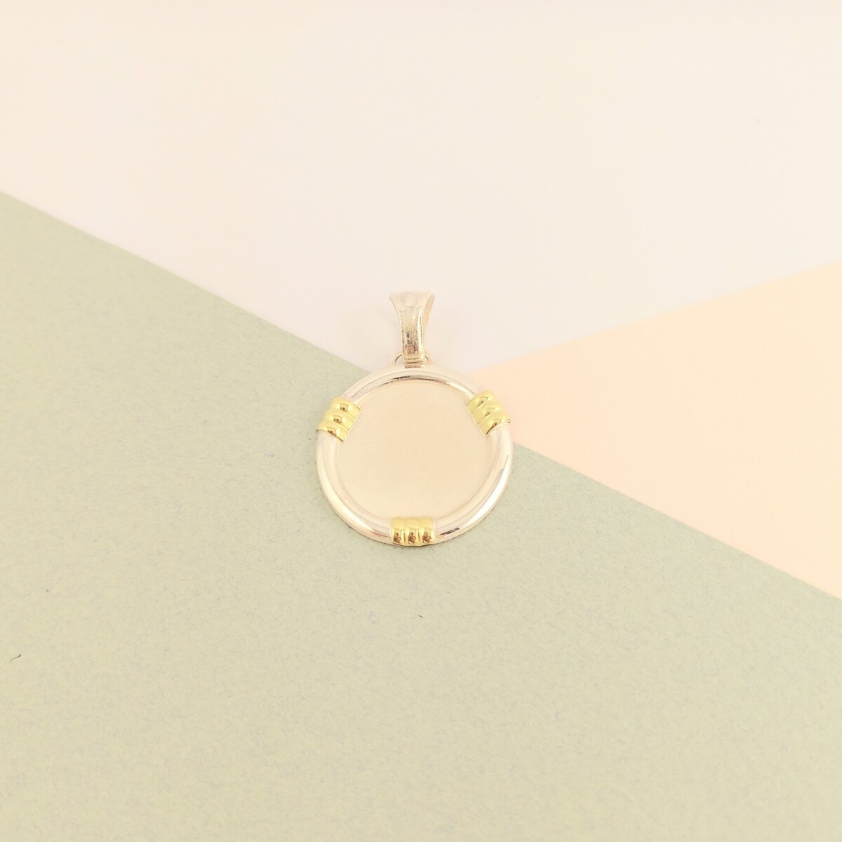 Medalla de plata 925 y double en oro 18 ktes. 