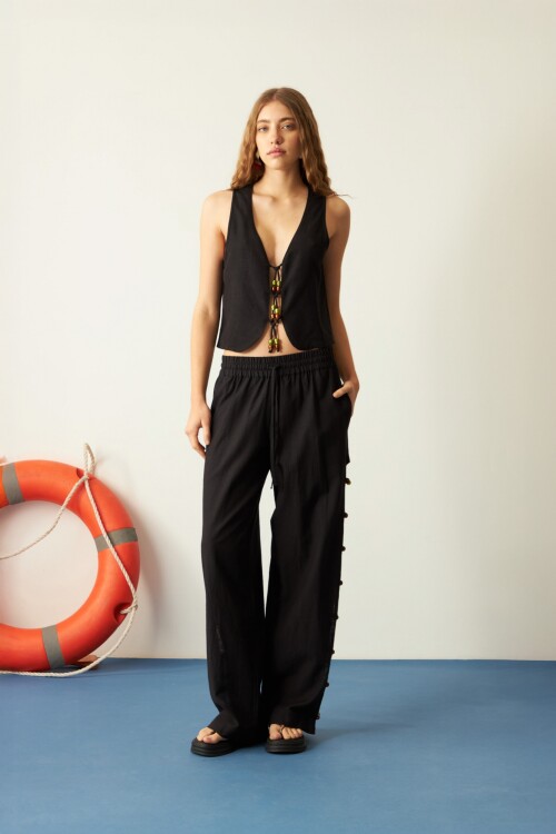 Pantalón con piedras negro