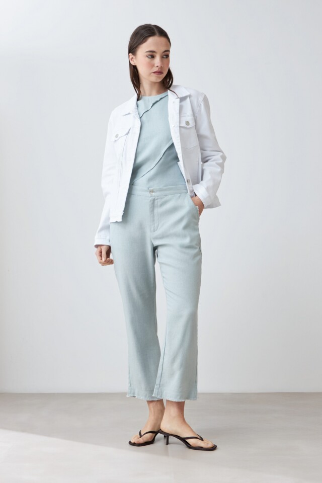 Pantalón de lino con efecto desflecado verde agua